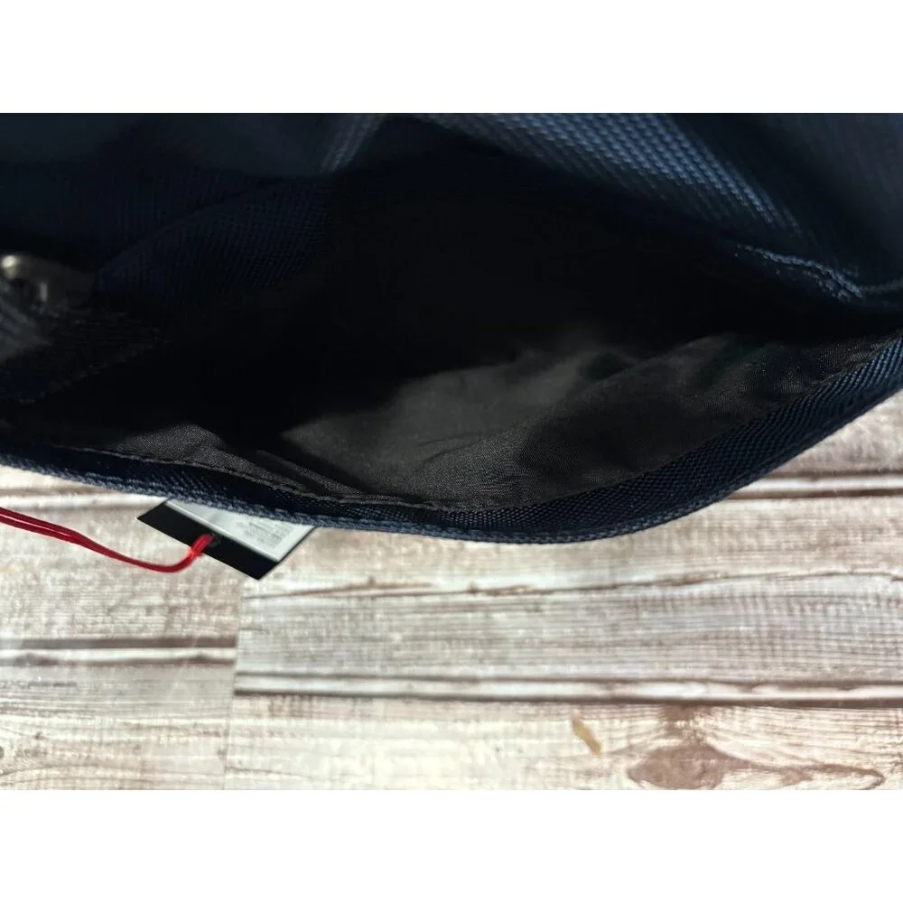 Tumi Fremont KERBY 9.5” Sling Crossbody Bag color NAVY BLUE NWT mspr $295